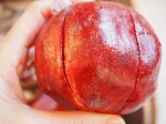 Score the pomegranate